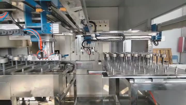 五金泵噴砂齒輪自動上下料噴烤一體流水線